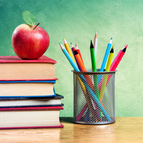 Image of an apple on top of books and a pencil cup